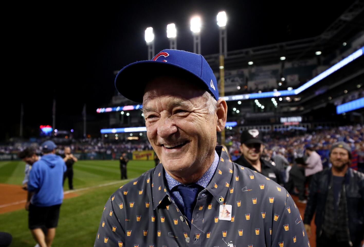 Bill Murray wears a William Murray Golf short bearing the "Old Fashioned"design on the field after the Chicago Cubs defeated the Cleveland Indians 8-7 in Game Seven of the 2016 World Series at Progressive Field on November 2, 2016 in Cleveland, Ohio.