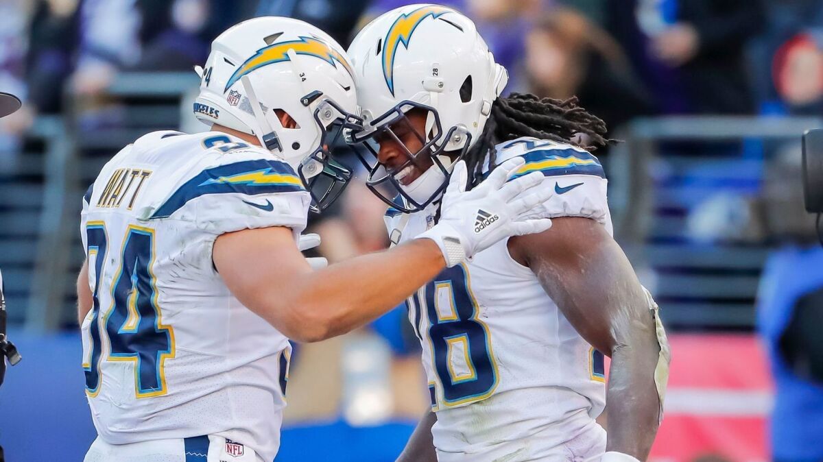 If the Chargers are to succeed against the Patriots, running back Melvin Gordon (28), shown celebrating with fullback Derek Watt last week, will be a key.