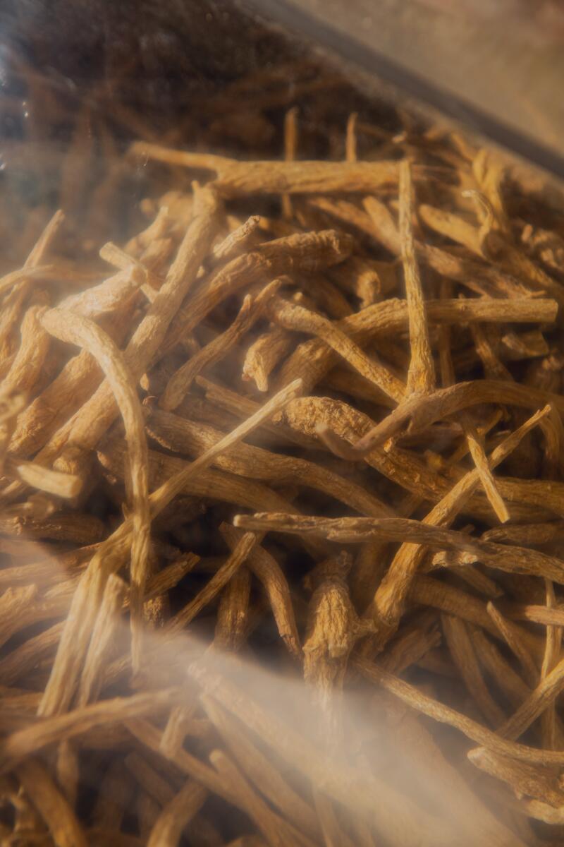 From top, left: Dry herbs, roots, and spices inside Tian Xiang.