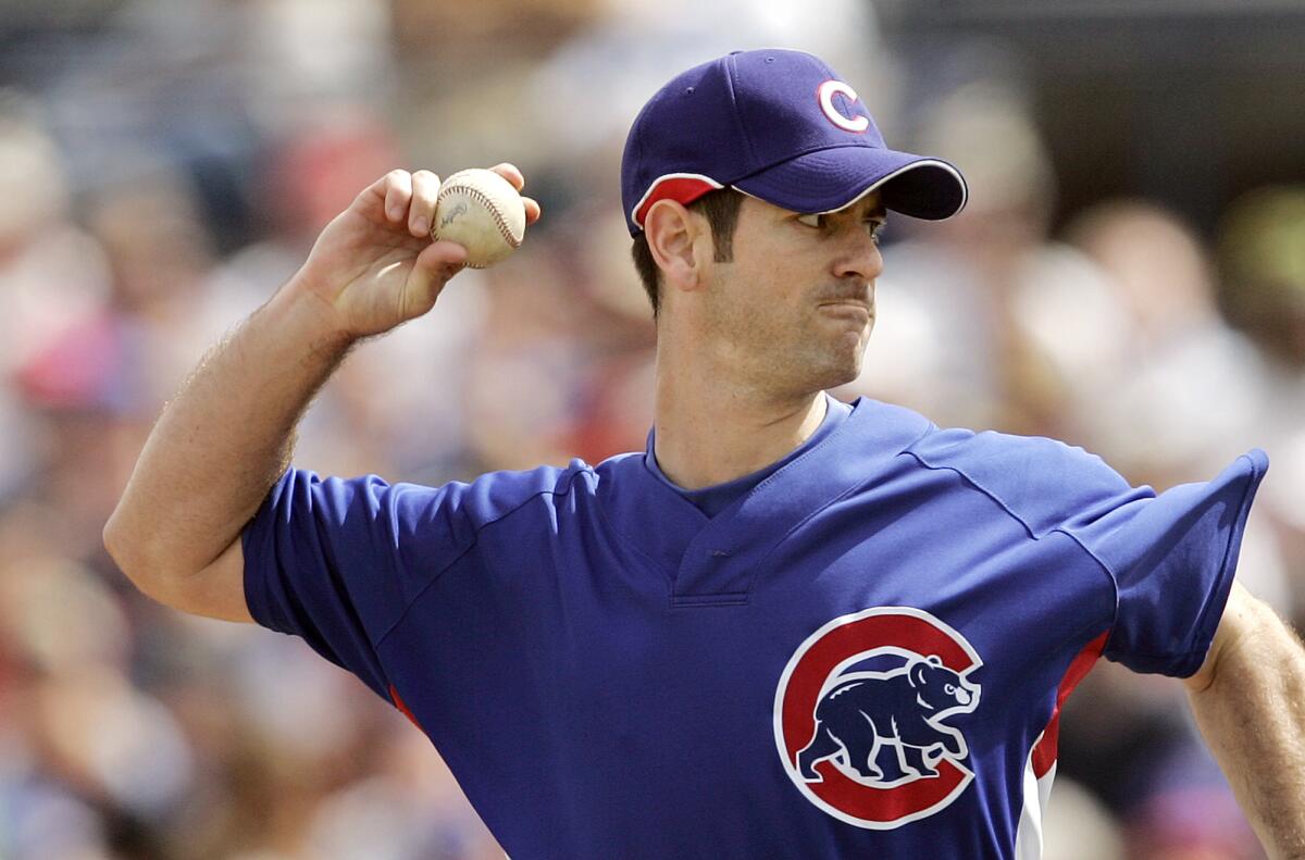 Mark Prior pitches against the Seattle Mariners in a 2007 spring training game in Peoria, Ariz.