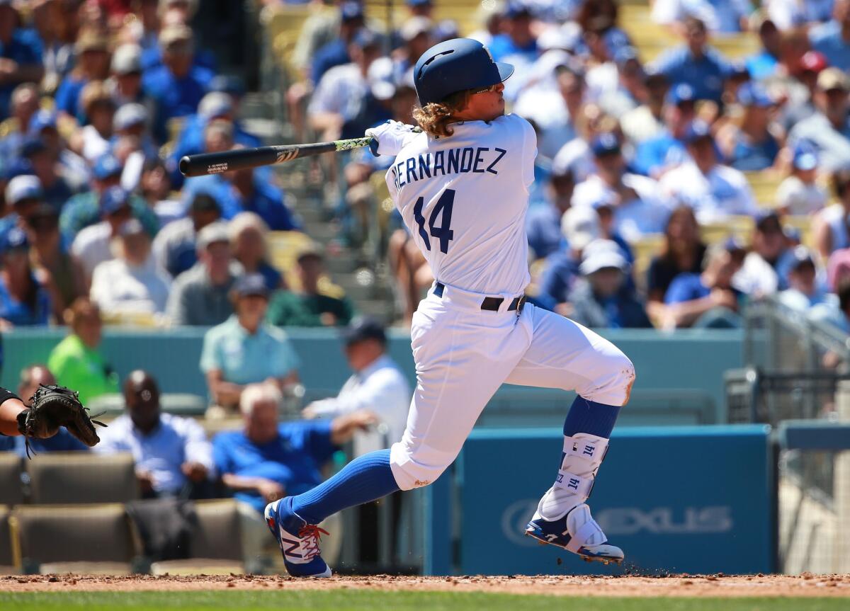 Dodgers' Enrique Hernandez singles against Arizona on April 12.