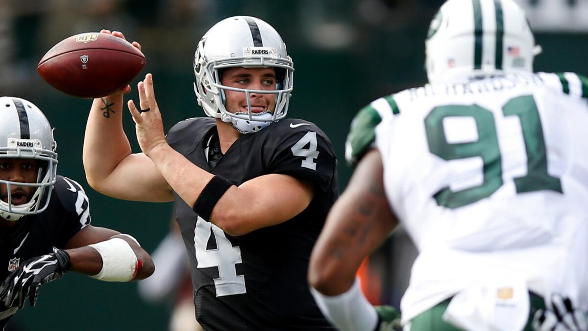 Raiders quarterback Derek Carr passed for 333 yards and four touchdowns in a win over the Jets on Sunday.