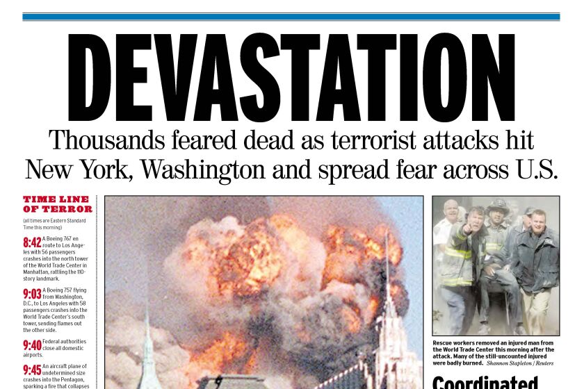 Front page of The San Diego Union-Tribune Extra Edition, September 11, 2001, showing buildings on fire in New York