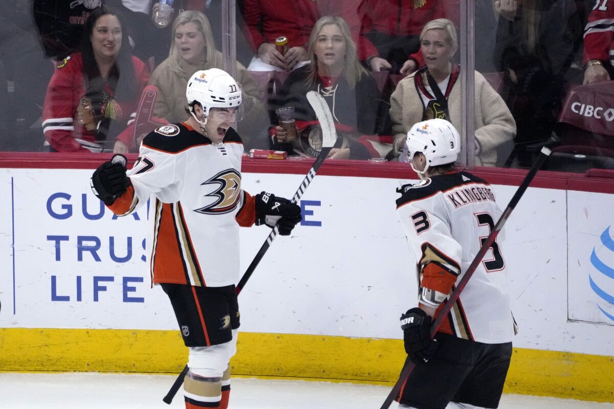Ducks' Frank Vatrano celebrates his game winning goal with John Klingberg.