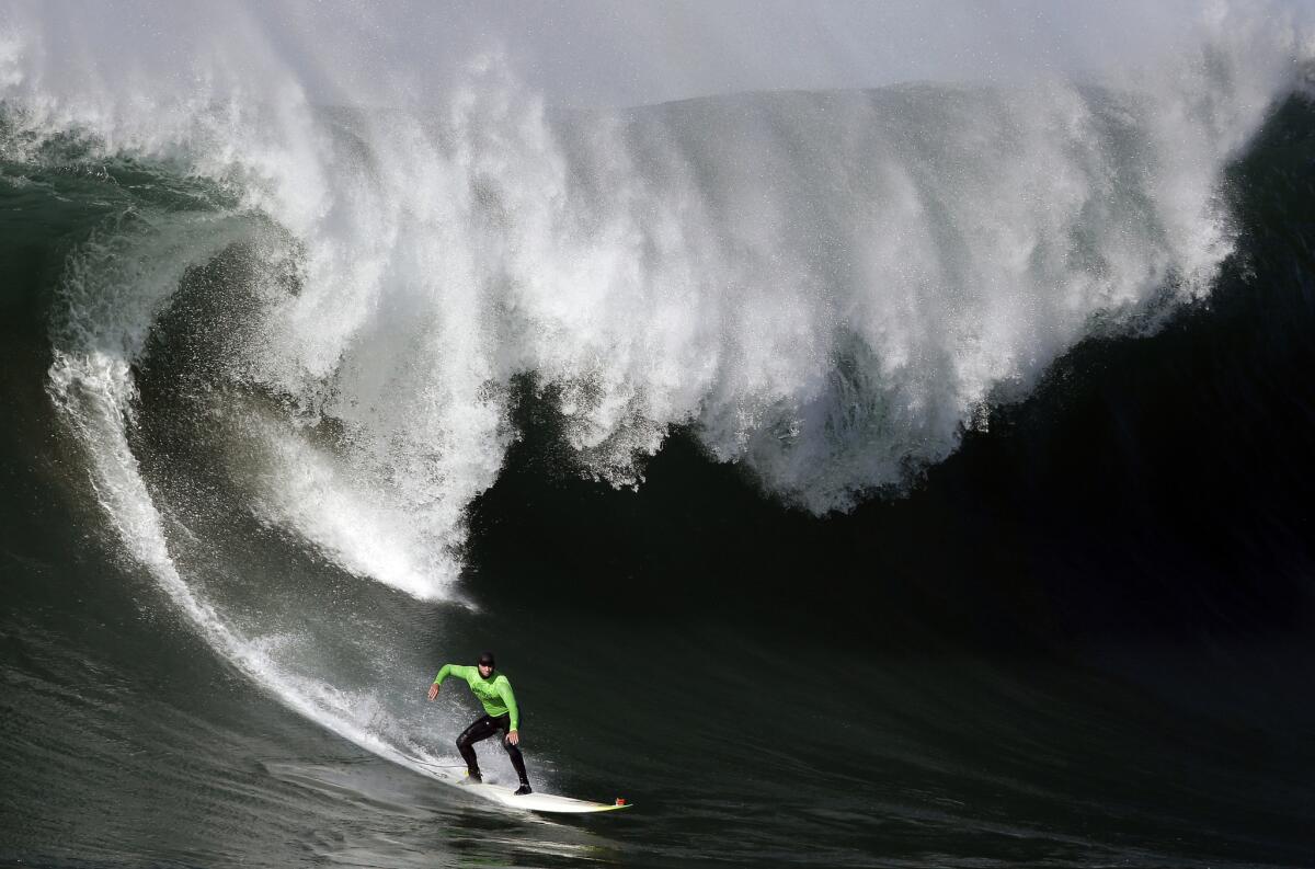 A surfer at the 2013 Mavericks Surf Competition in Half Moon Bay.