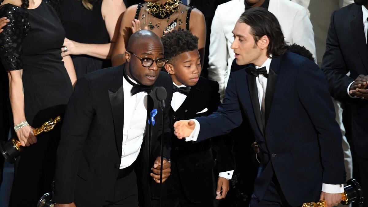 Director Barry Jenkins and the cast and crew of "Moonlight" accept the Best Picture award onstage during the 89th Annual Academy Awards in 2017.
