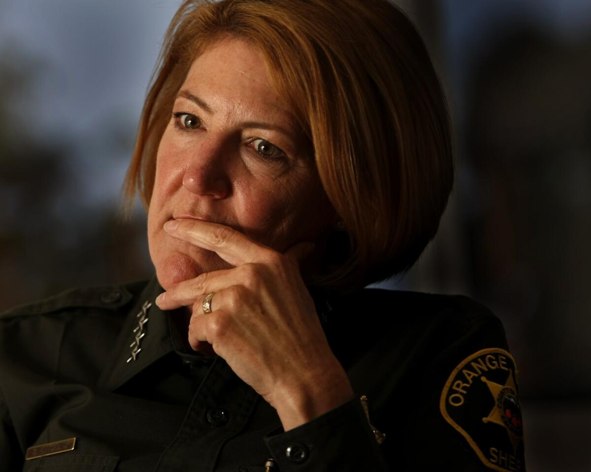 Orange County Sheriff Sandra Hutchens says she will eliminate an in-person gun inspection component of the concealed weapons permit application process to help ease the overwhelming backlog.