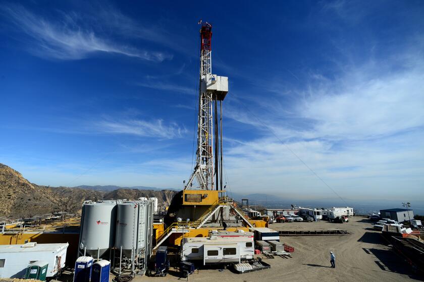 In this Dec. 9, 2015, file photo, crews work on a relief well at the Aliso Canyon facility above the Porter Ranch area of Los Angeles. The leak was sealed Feb. 18.