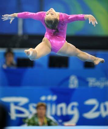 U.S. gymnast Shawn Johnson practices her floor exercise in preparation for the 2008 Beijing Olympics.