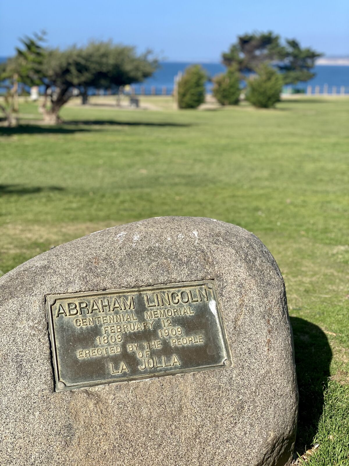 The flagstaff at the Abraham Lincoln Centennial Memorial has been removed, but the plaque at its base remains.
