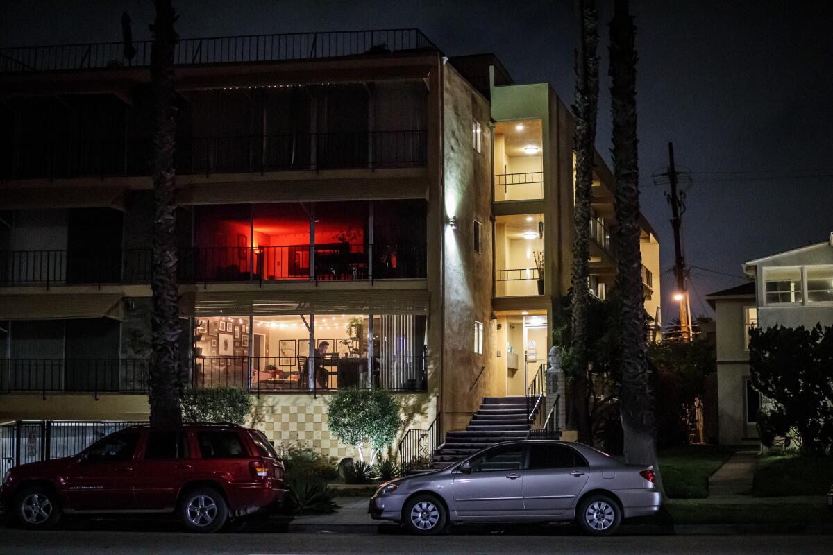 A man works from his home in Long Beach. 