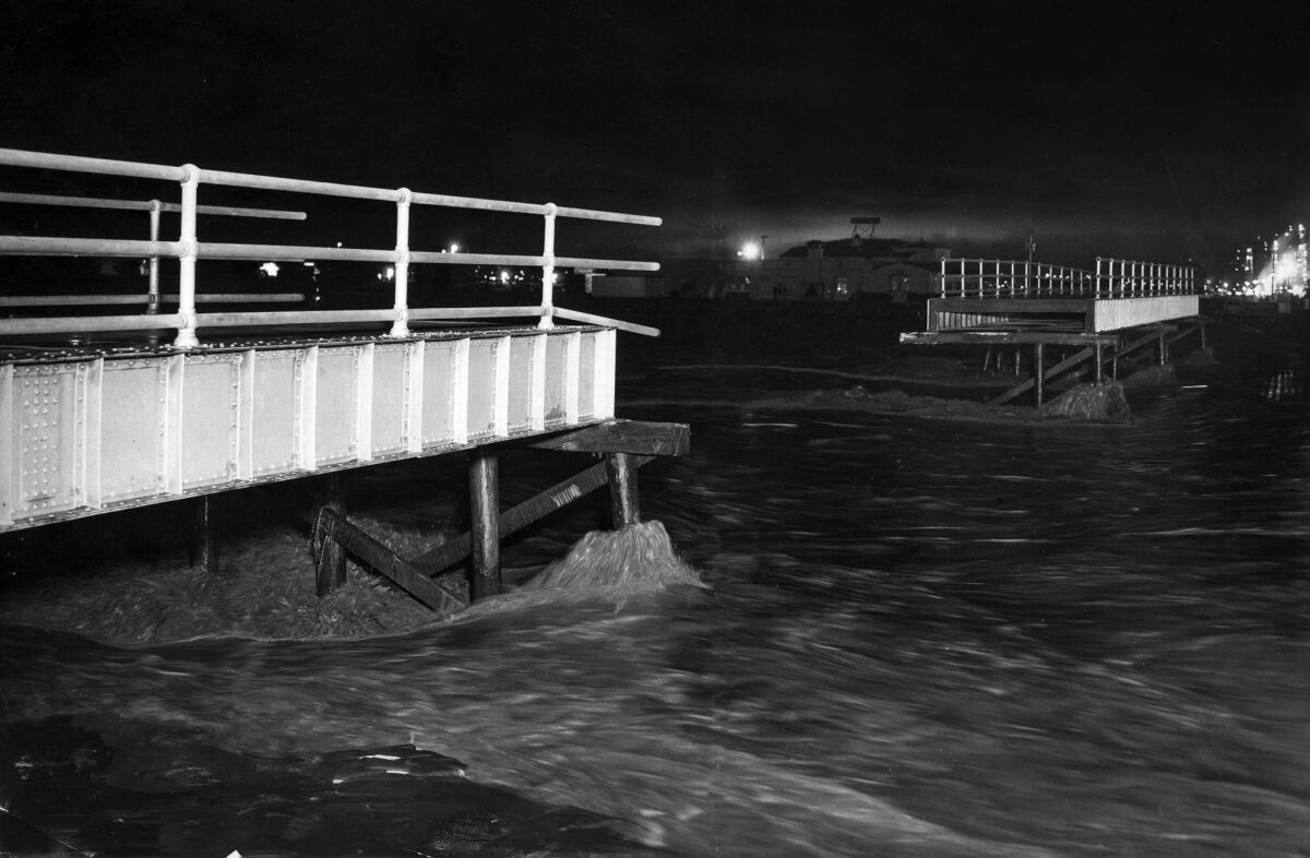 March 2, 1938: About 10 people were swept into the water when the 3rd Street pedestrian bridge over the Los Angeles River in Long Beach washed out after heavy rains.
