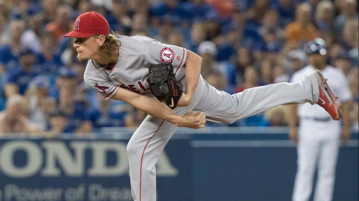 Jered Weaver pitches against the Blue Jays on Thursday in one of his better outings this season.