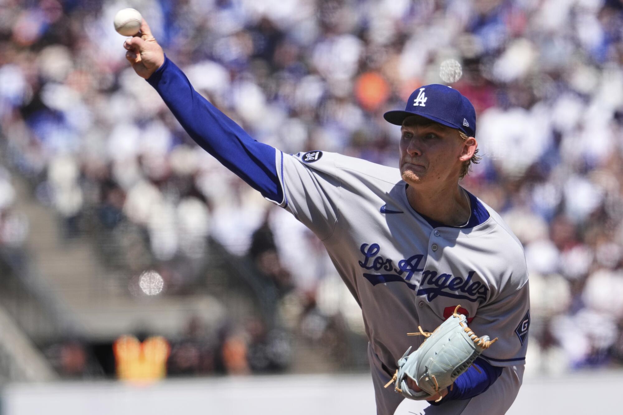 Dodgers pitcher Emmet Sheehan delivers during the seventh inning against the Giants on Saturday.
