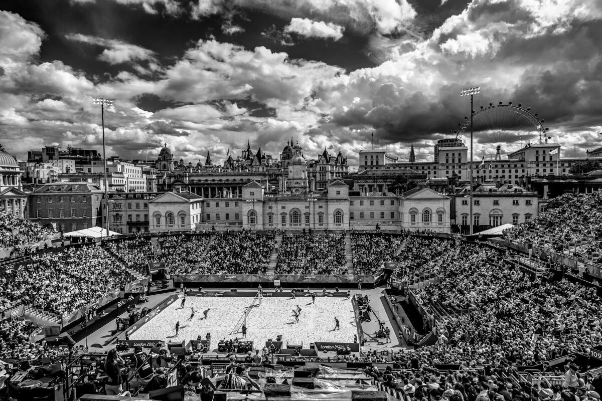 The juxtaposition of beach volleyball and the London skyline in 2012. (David Burnett / Anastasia Photo / Contact Press Images)