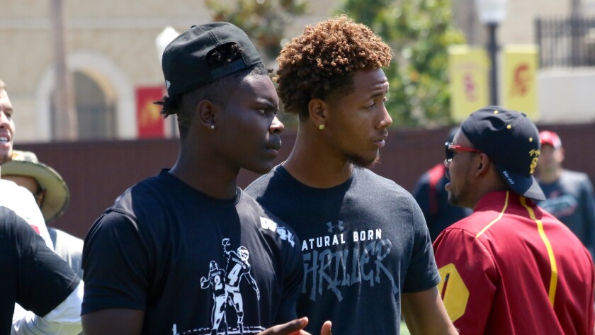 Jalen Hall, right, and Joseph Lewis were blue-chip recruits at Hawkins High in Los Angeles. Hall would transfer to Long Beach Poly.