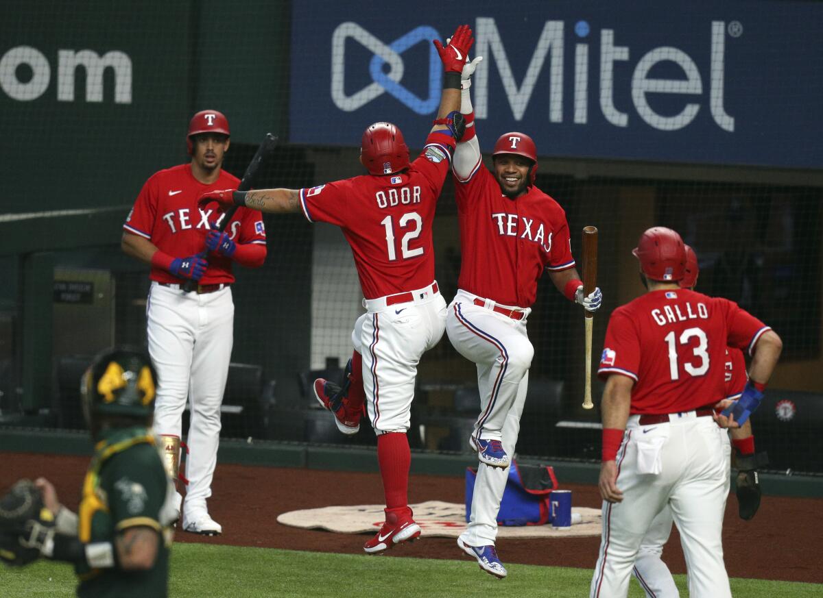 Elvis Andrus of the Texas Rangers strikes out in the 6th inning