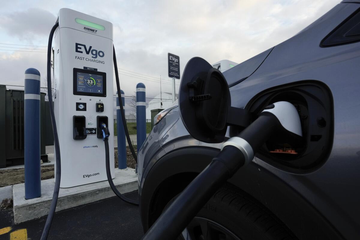 An electric vehicle at a charging station in Detroit.