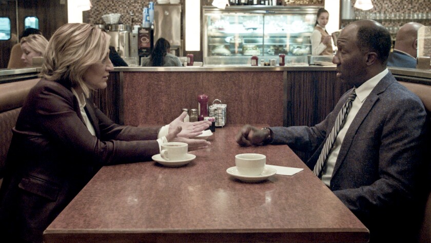 Edie Falco and Russell G. Jones in in a new episode of the police drama "Tommy" on CBS.