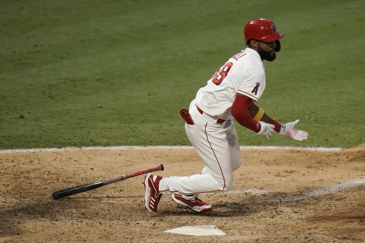 The Angels' Jo Adell watches his walk-off single during the seventh inning in Game 1 on Sept. 5, 2020.
