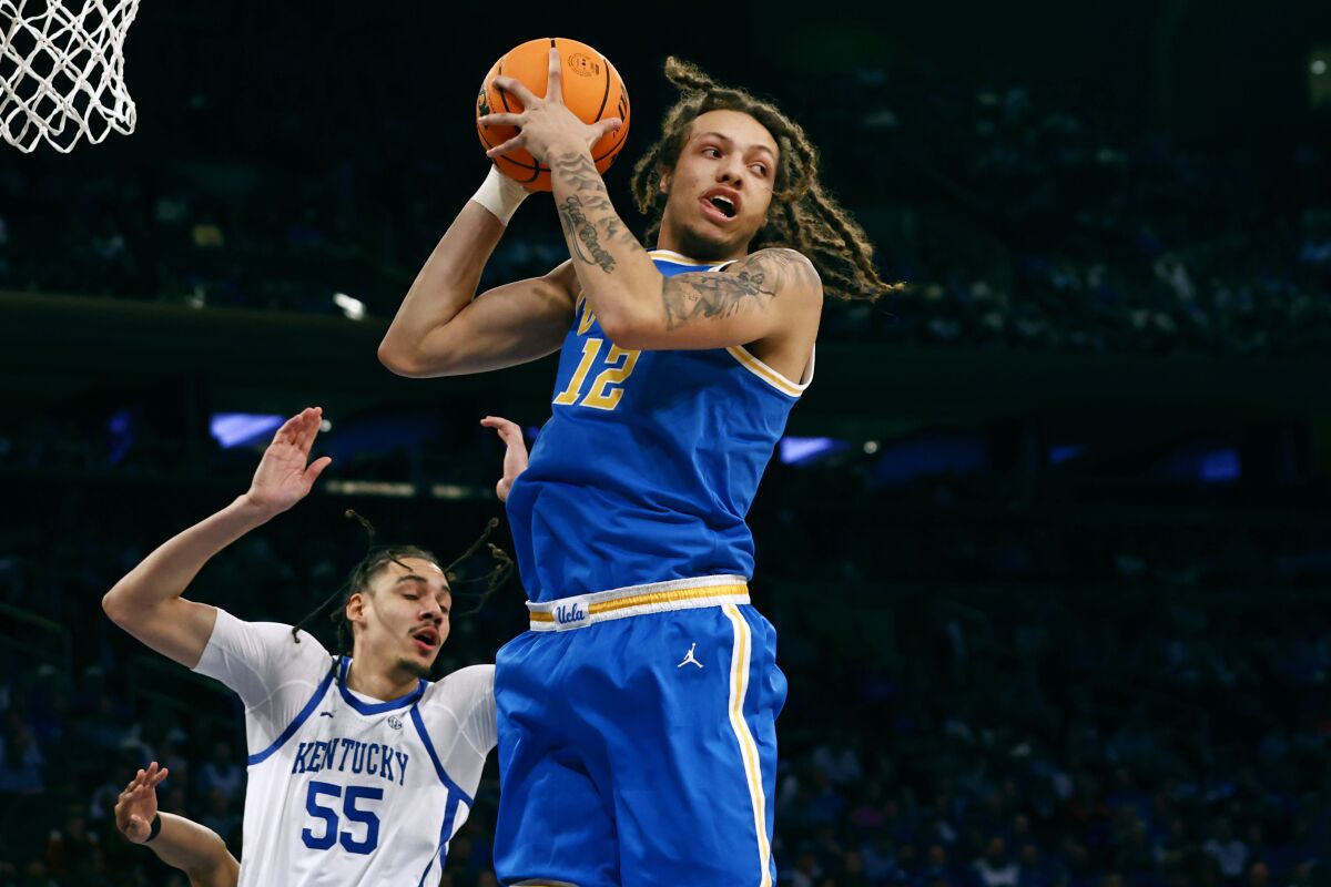 UCLA's Mac Etienne controls the ball in a win over Kentucky at Madison Square Garden in New York December 17.