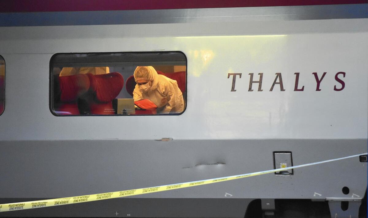 Police inspect a high-speed Thalys train after three Americans thwarted an attack during a trip from Amsterdam to Paris.