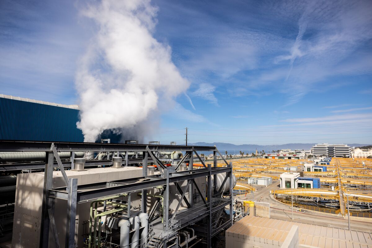 Steam rises from an outdoor generator
