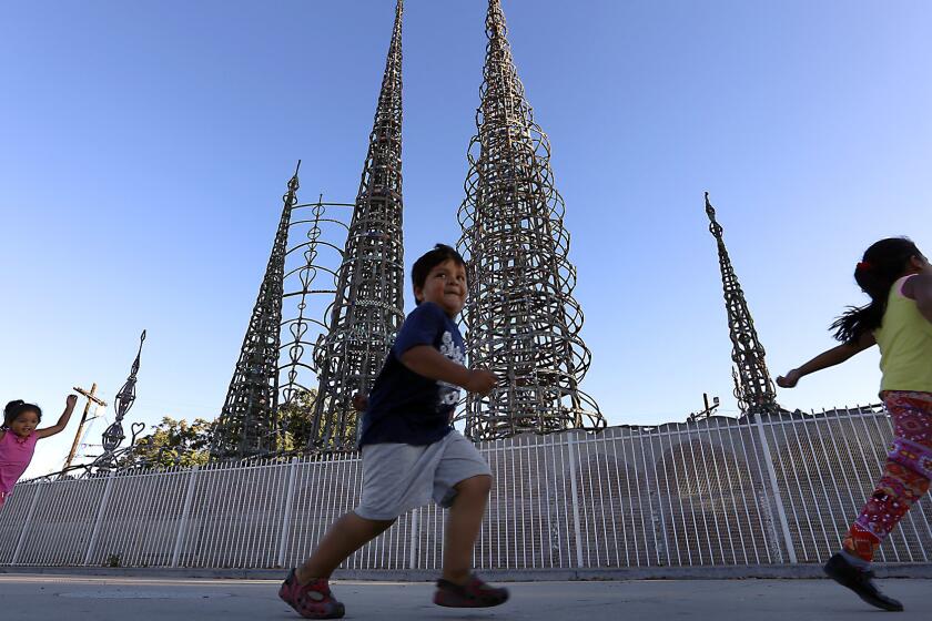 The Watts Towers were begun in 1921 and completed in 1954.