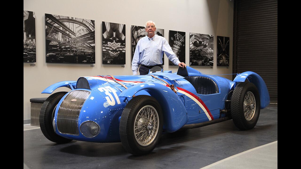 Peter Mullin, founder of the Mullin Automotive Museum in Oxnard, beside his 1937 Delahaye 145 race car.