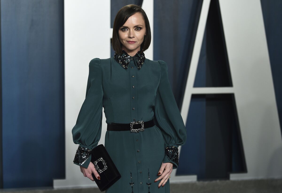 FILE - In this Feb. 9, 2020 file photo, Christina Ricci arrives at the Vanity Fair Oscar Party in Beverly Hills, Calif. The actress has filed for divorce from her husband of nearly seven years. Ricci filed documents in Los Angeles County Superior Court on Thursday to dissolve her marriage with James Heerdegen. (Photo by Evan Agostini/Invision/AP, File)