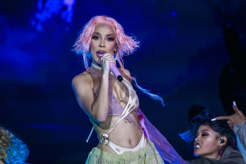 Las Vegas, CA - November 13: Doja Cat performs on the Frank Stage on the second day of the three-day Day N Vegas hip-hop music festival at the Las Vegas Festival Grounds in Las Vegas on Saturday, Nov. 13, 2021. (Allen J. Schaben / Los Angeles Times)