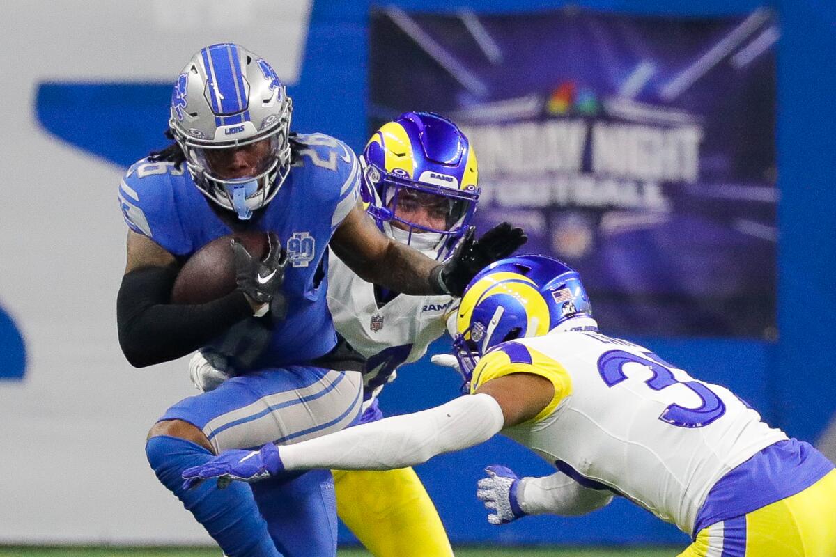 Detroit Lions running back Jahmyr Gibbs carries the ball during the first half.