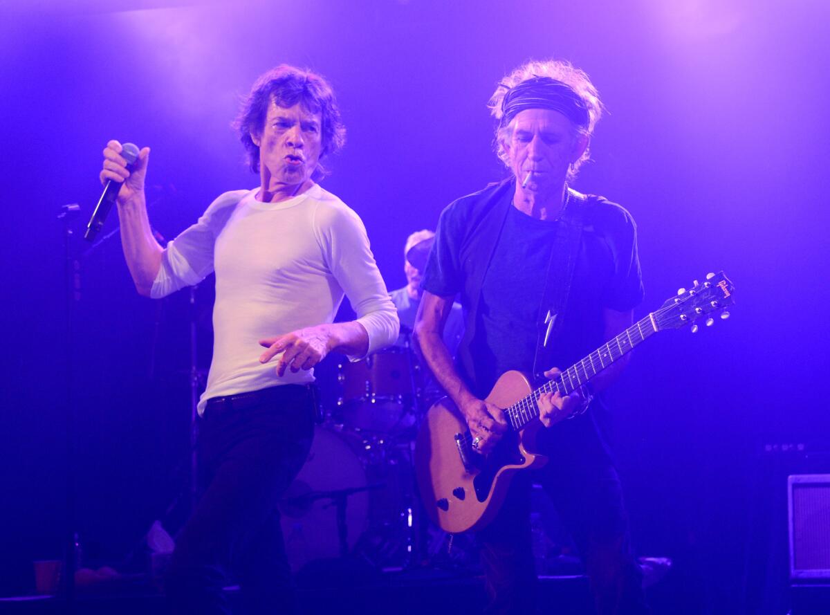 Musicians Mick Jagger (L) and Keith Richards of The Rolling Stones perform at Echoplex. The band will play another club show in Hollywood on May 20.