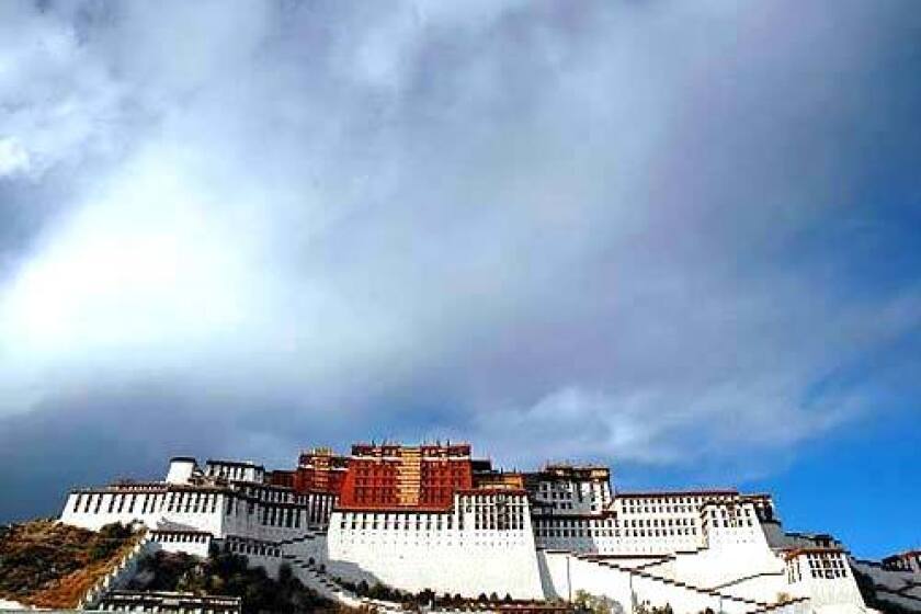 Potala Palace, a sacred site for Buddhist pilgrims, commands a hillside in Lhasa, Tibet. It is the former home of the Dalai Lama.