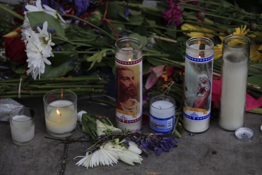 A memorial grows in Isla Vista for a shooting victim.