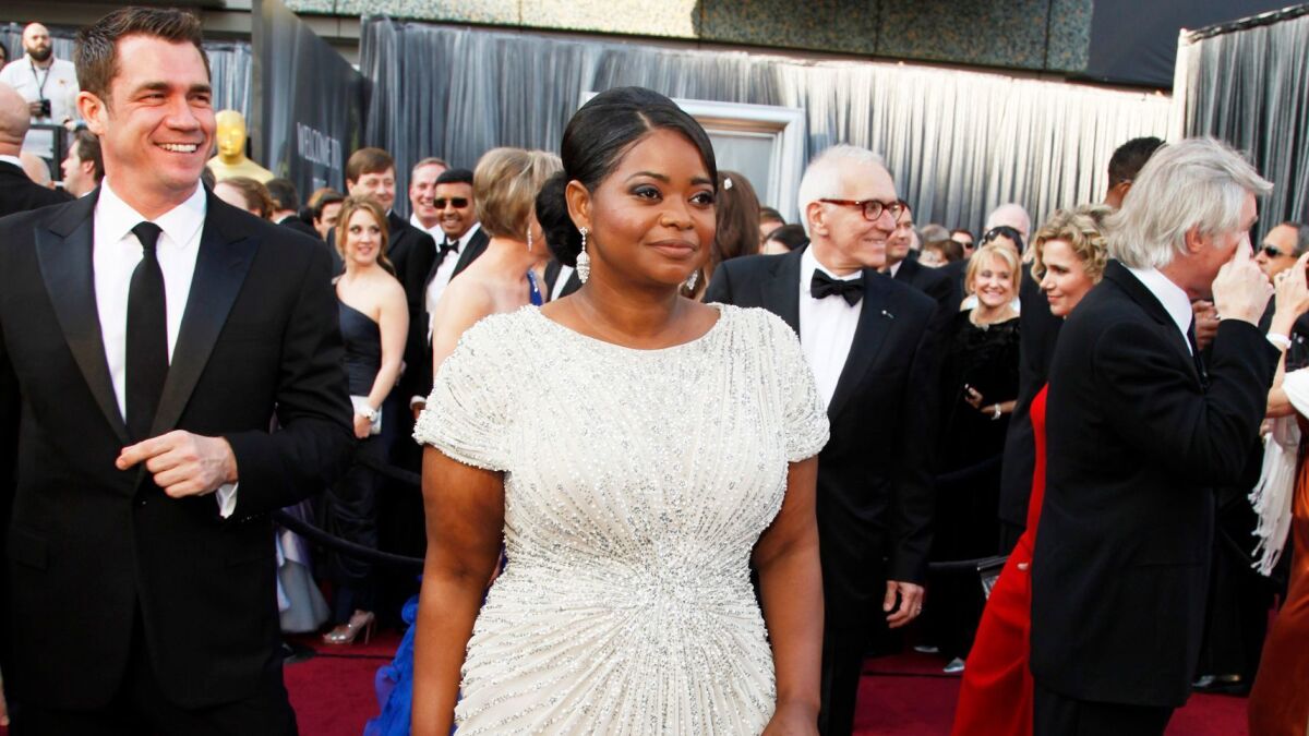 Oscar winner Octavia Spencer wears a Tadashi Shoji gown to the 84th Academy Awards in Los Angeles on Feb. 26, 2012. (Mark Boster / Los Angeles Times)