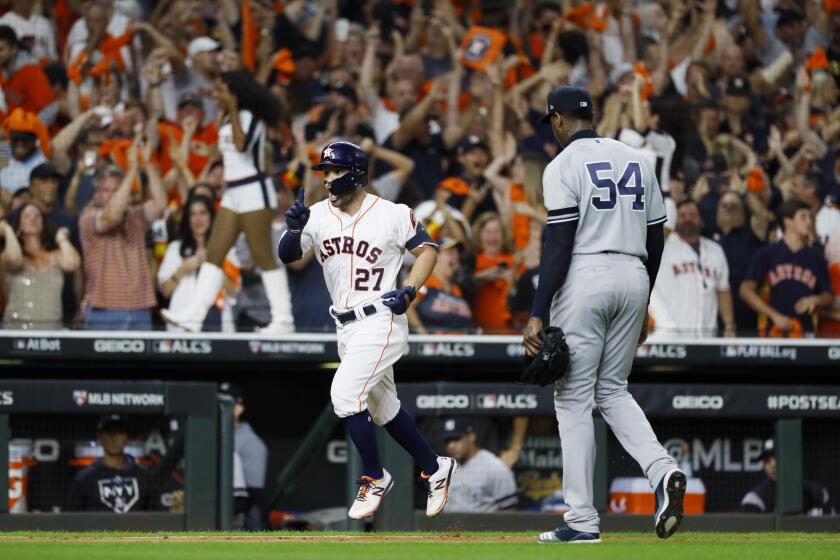 Houston Astros' Jose Altuve celebrate after a two-run home run off New York Yankees pitcher Aroldis Chapman to win Game 6 of baseball's American League Championship Series against the New York Yankees Saturday, Oct. 19, 2019, in Houston. The Astros won 6-4 to win the series 4-2. (AP Photo/Matt Slocum)