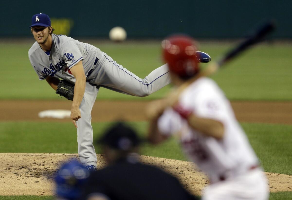 Dodgers starter Clayton Kershaw delivers a pitch during Tuesday's 5-1 loss to the St. Louis Cardinals.