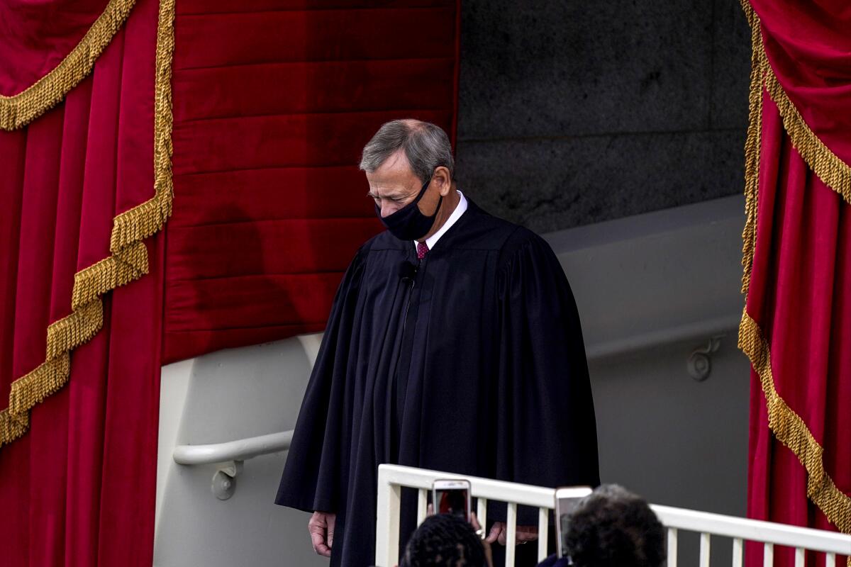 Chief Justice John G. Roberts Jr. arrives for President Biden's inauguration at the. Capitol on Jan. 20, 2021.