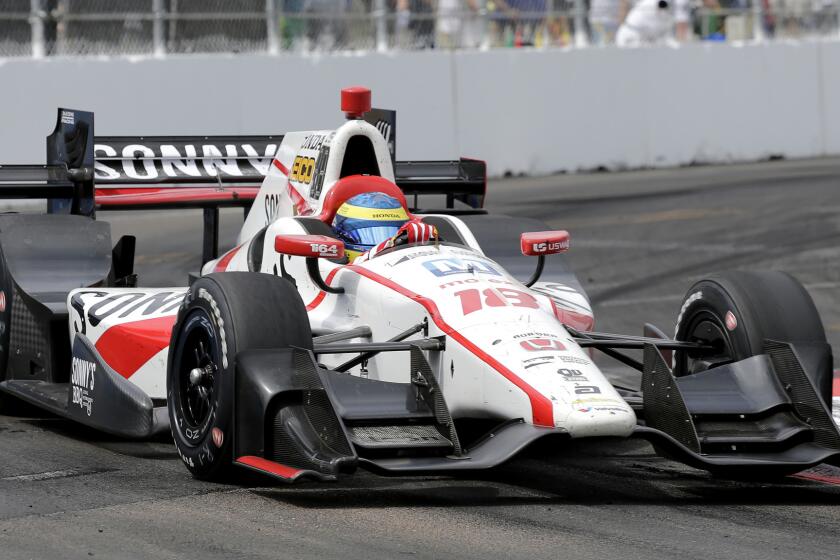 IndyCar driver Sebastien Bourdais takes a corner during the race at St. Petersburg on Sunday.