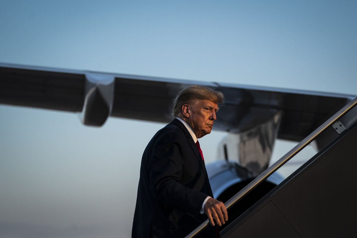 Manchester, NH - April 27 : Former President Donald Trump boards his airplane, known as "Trump Force One," after speaking at a campaign event, at the Manchester-Boston Regional Airport on Thursday, April 27, 2023, in Manchester, NH. (Photo by Jabin Botsford/The Washington Post via Getty Images)