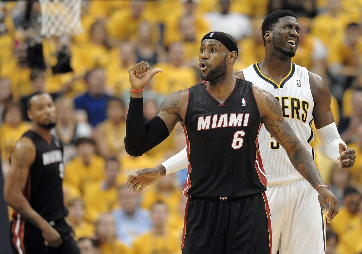 The Pacers limited LeBron James to seven points, four assists and two rebounds in a Game 5 victory over the Heat, 93-90. Miami leads the series, 3-2.