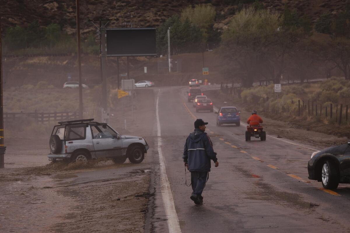A storm hit the Antelope Valley and Lake Hughes area on Thursday with rain, hail and mudslides that left motorists stranded and some in need of rescue.