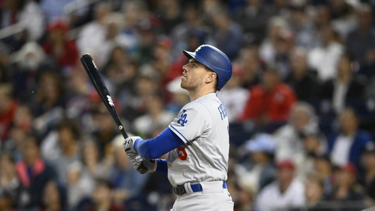Dodgers first baseman Freddie Freeman hits against the Washington Nationals on Monday.