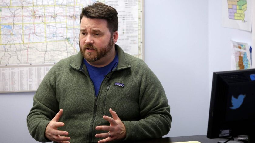 Iowa Democratic Party Chairman Troy Price said changes were made to the state's caucuses to address national party concerns while trying to maintain the local "spirit."