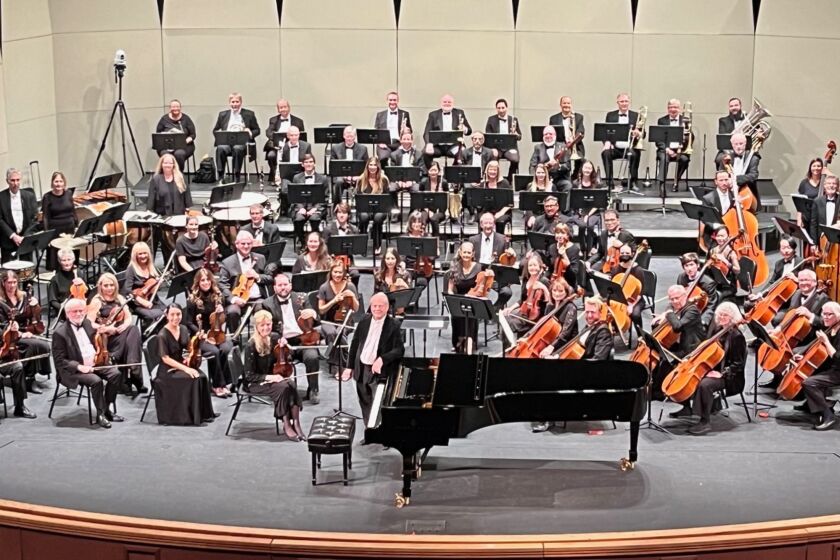 Music director and conductor John LoPiccolo, center, with the Poway Symphony Orchestra.