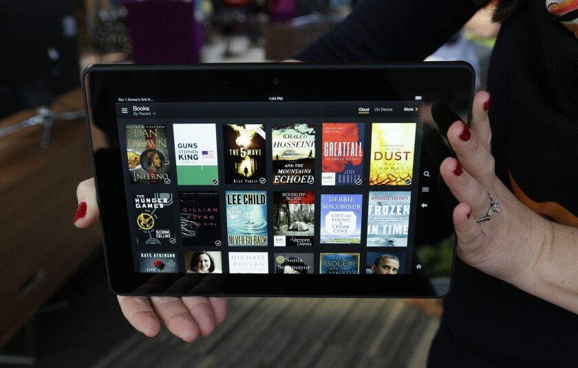 Amazon.com is reportedly working on a payment system that would allow businesses to use Kindle tablets to process payments.