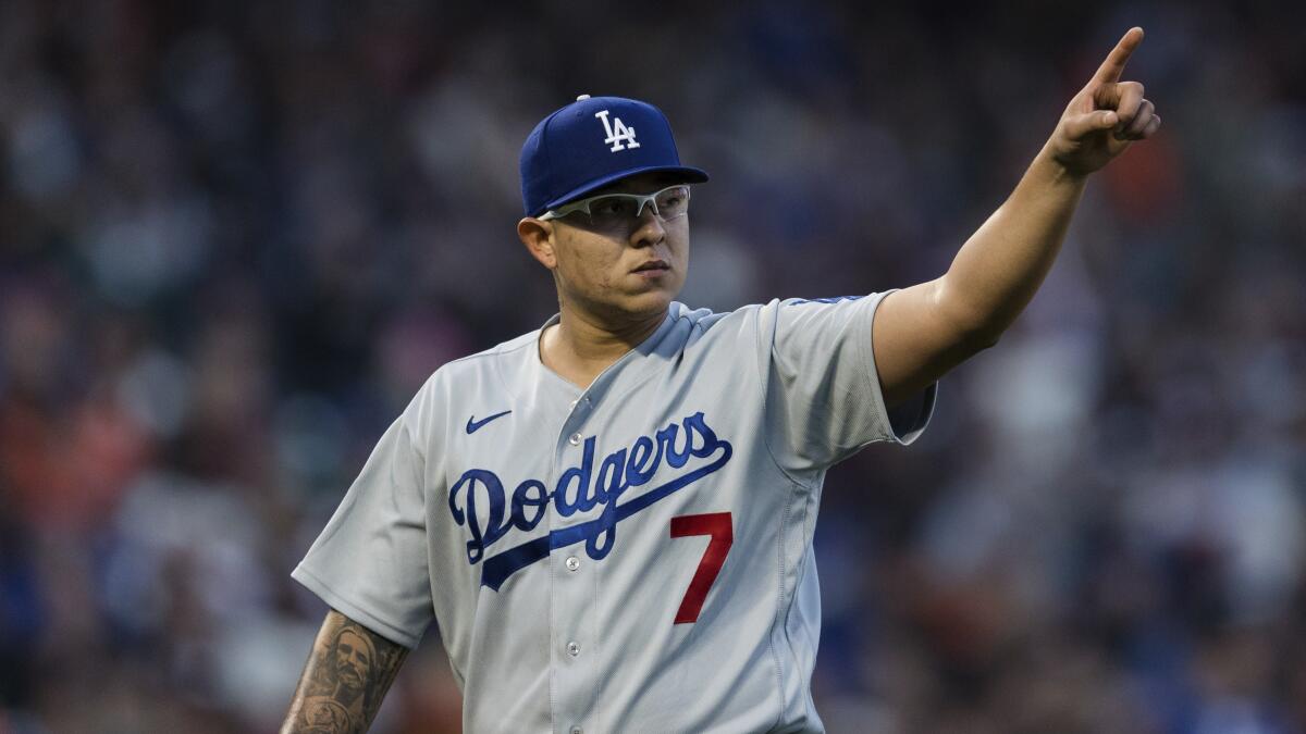 Julio Urías helps Dodgers beat Giants, move back into first - Los Angeles  Times
