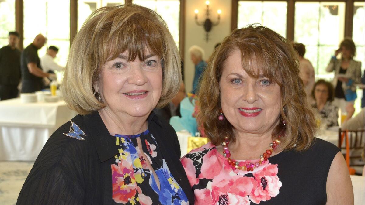 Guild members Veronica Chavoor, left, and Carrie McCoy, who chaired this year's Spring Social that was enjoyed by close to 200 members and guests.