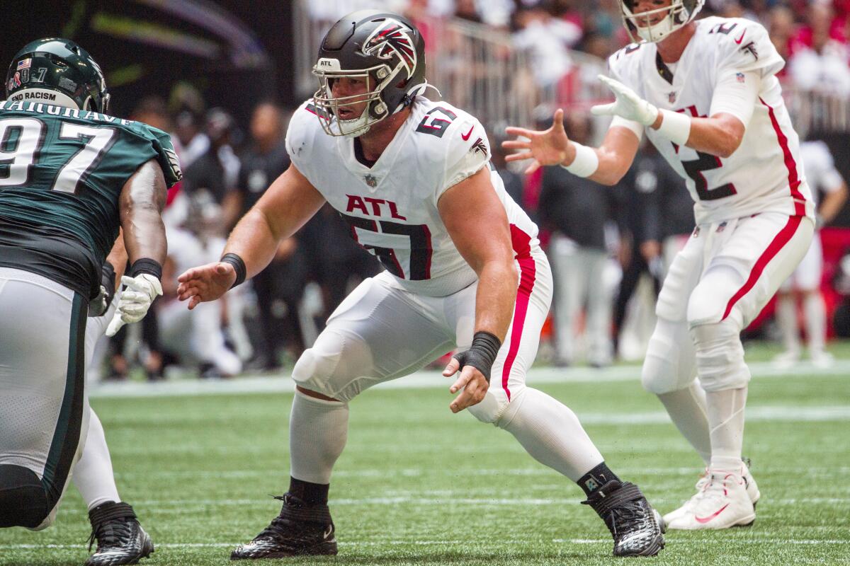FILE -Atlanta Falcons center Drew Dalman (67) works during the first half of an NFL football game against the Philadelphia Eagles, Sunday, Sep. 12, 2021, in Atlanta. The Atlanta Falcons have named Drew Dalman as their starting center for Sunday, Sept. 11, 2022 opener against the New Orleans Saints.(AP Photo/Danny Karnik, File)